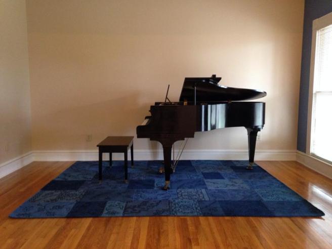 Howard baby grand piano